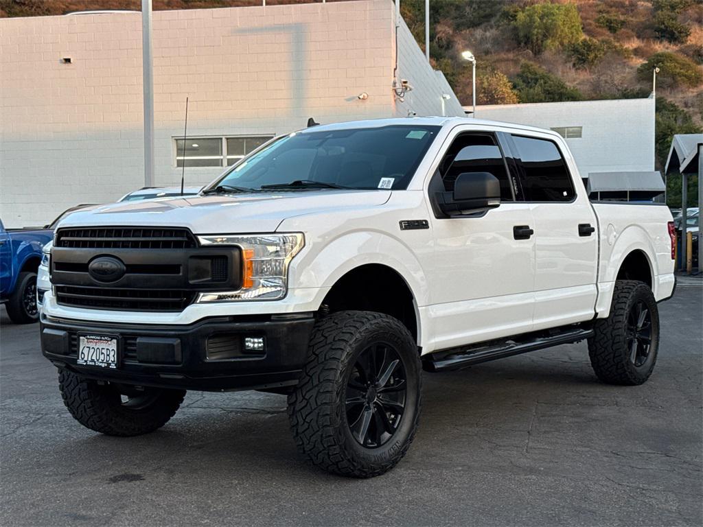 used 2019 Ford F-150 car, priced at $23,442