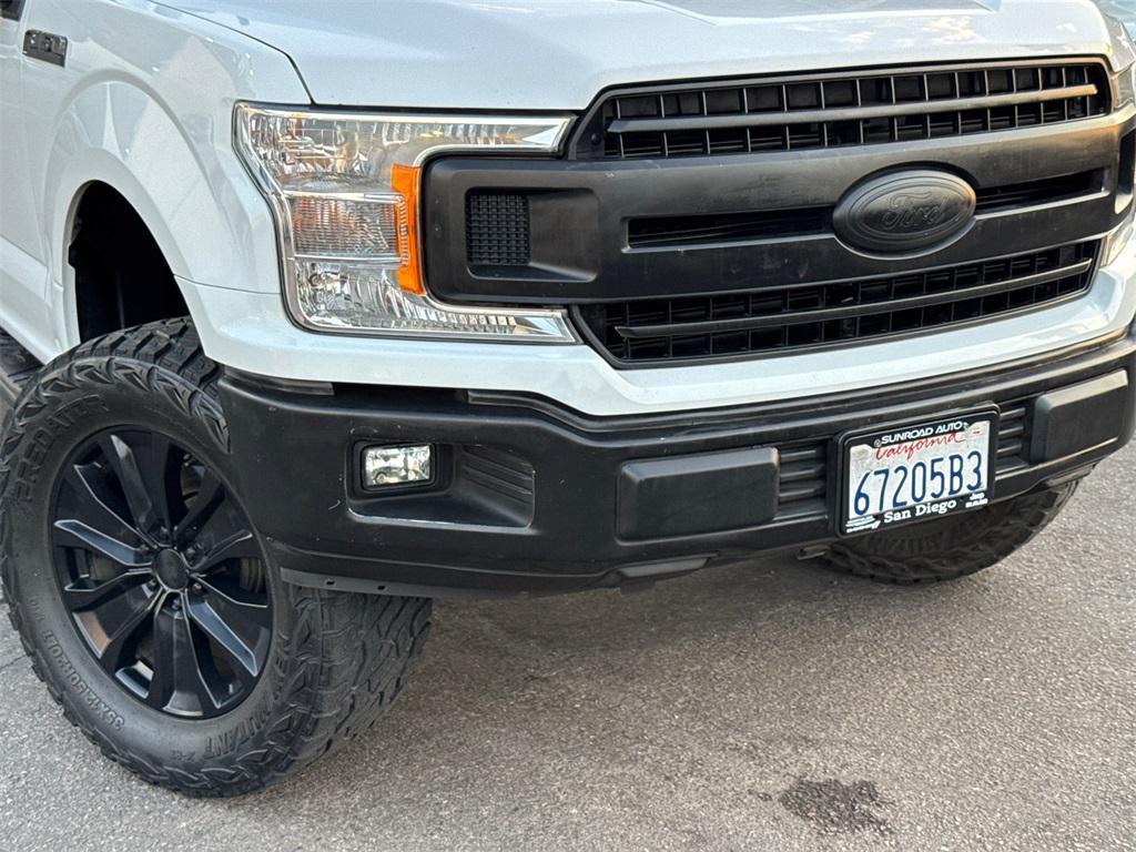 used 2019 Ford F-150 car, priced at $23,442