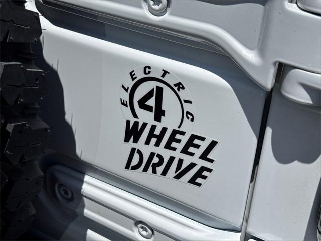used 2023 Jeep Wrangler 4xe car, priced at $30,888