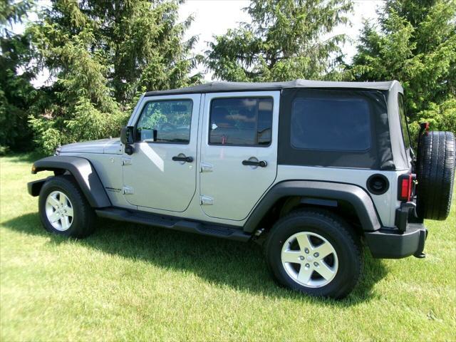 used 2014 Jeep Wrangler Unlimited car, priced at $19,975