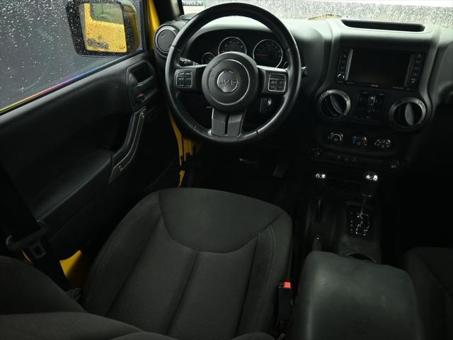 used 2015 Jeep Wrangler Unlimited car, priced at $19,553