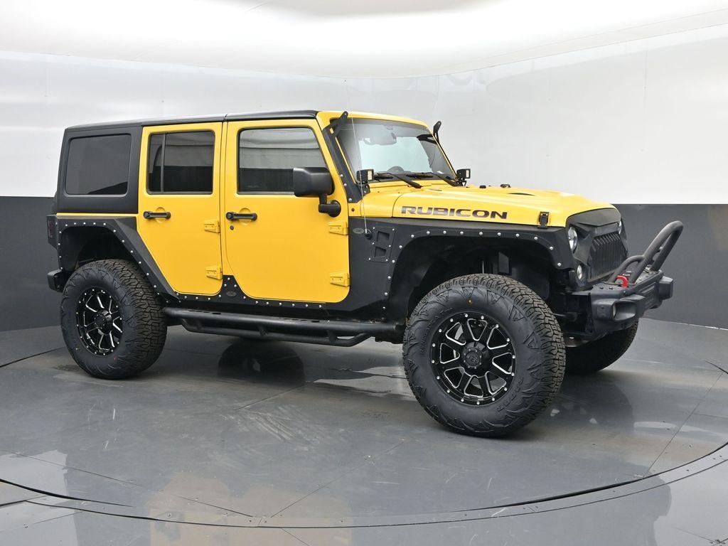used 2015 Jeep Wrangler Unlimited car, priced at $21,848