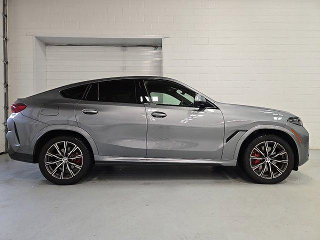 used 2025 BMW X6 car, priced at $77,625