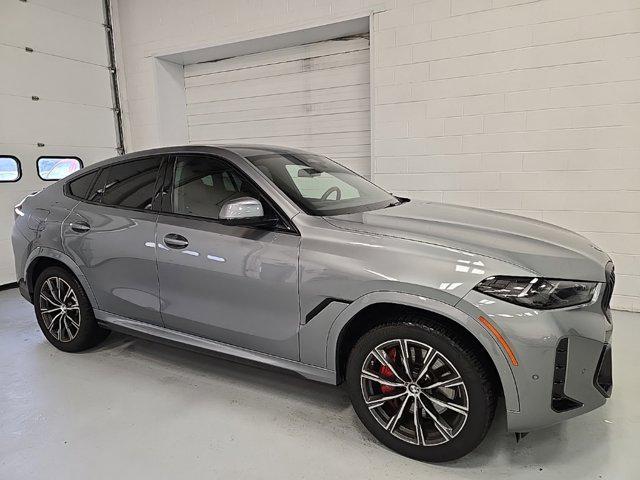 used 2025 BMW X6 car, priced at $77,625