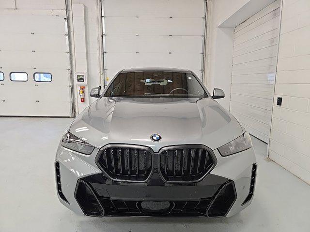 used 2025 BMW X6 car, priced at $77,625