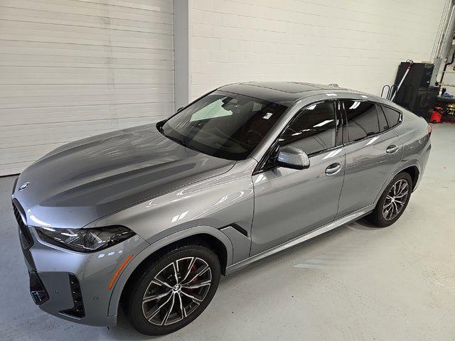 used 2025 BMW X6 car, priced at $77,625