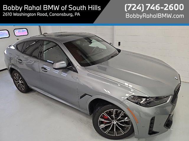 used 2025 BMW X6 car, priced at $77,625