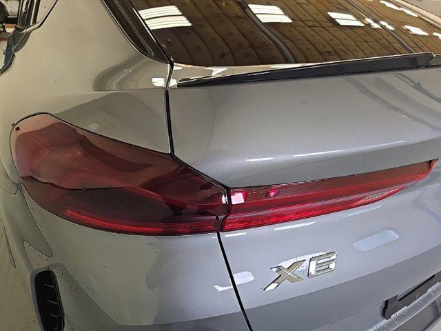 used 2025 BMW X6 car, priced at $77,625