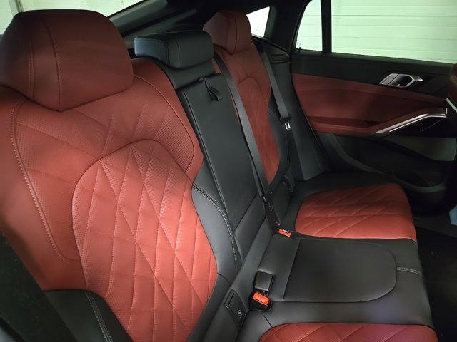 used 2025 BMW X6 car, priced at $77,625