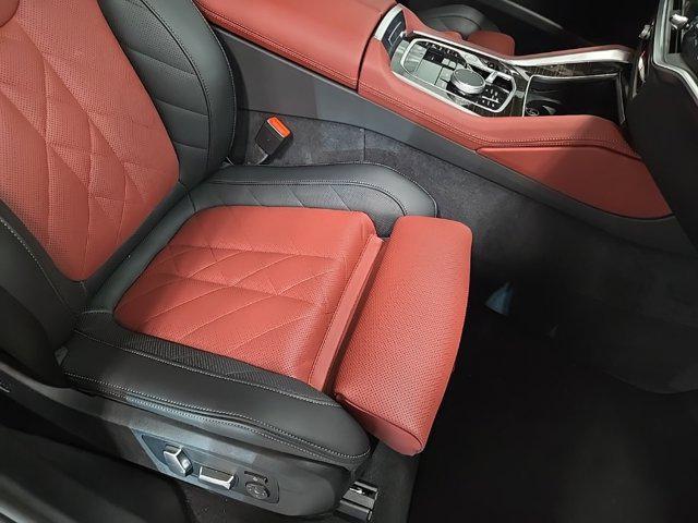 used 2025 BMW X6 car, priced at $77,625