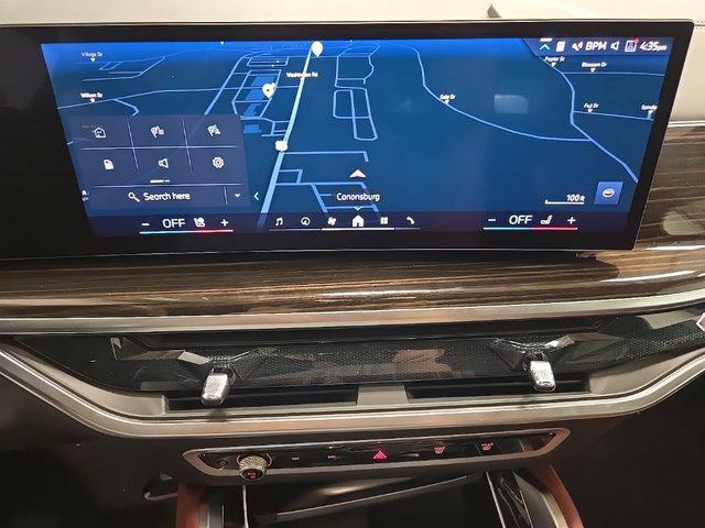 used 2025 BMW X6 car, priced at $77,625