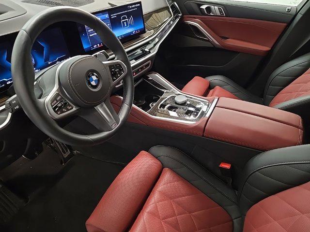 used 2025 BMW X6 car, priced at $77,625