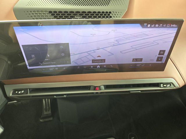 new 2026 BMW iX car, priced at $104,175