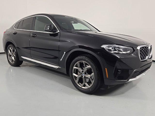used 2025 BMW X4 car, priced at $53,325