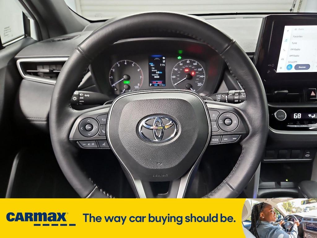 used 2024 Toyota Corolla Cross Hybrid car, priced at $32,998