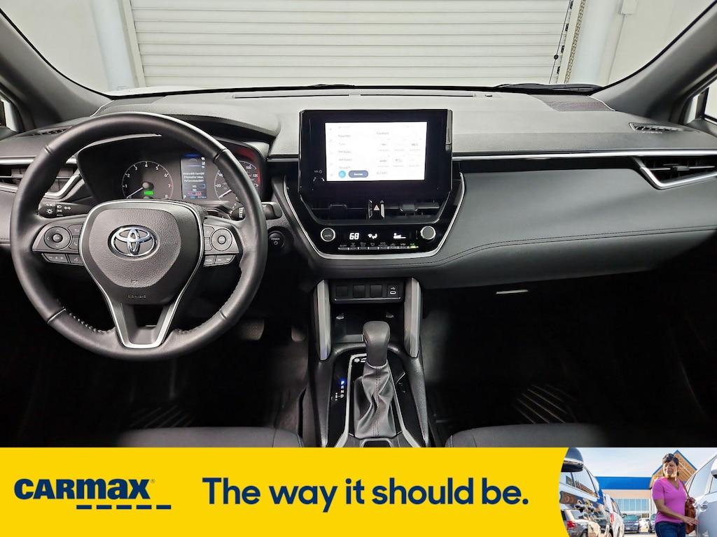 used 2024 Toyota Corolla Cross Hybrid car, priced at $32,998