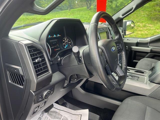 used 2018 Ford F-150 car, priced at $23,250