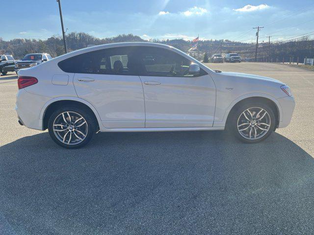 used 2018 BMW X4 car, priced at $25,495