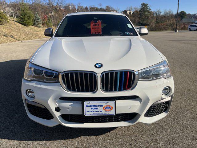 used 2018 BMW X4 car, priced at $25,495