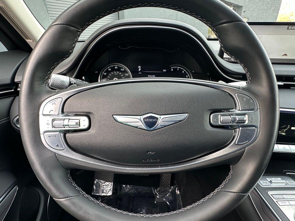 used 2023 Genesis GV70 car, priced at $35,460