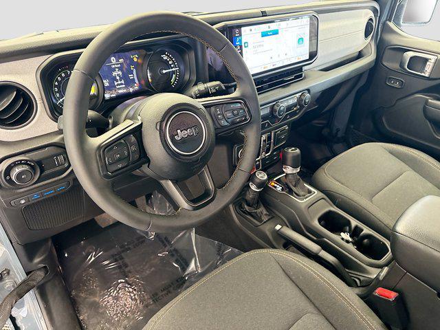 used 2024 Jeep Wrangler 4xe car, priced at $37,935