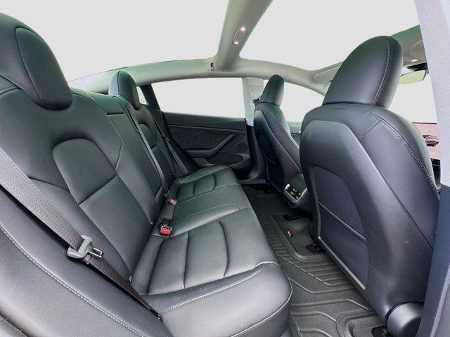 used 2023 Tesla Model 3 car, priced at $27,599