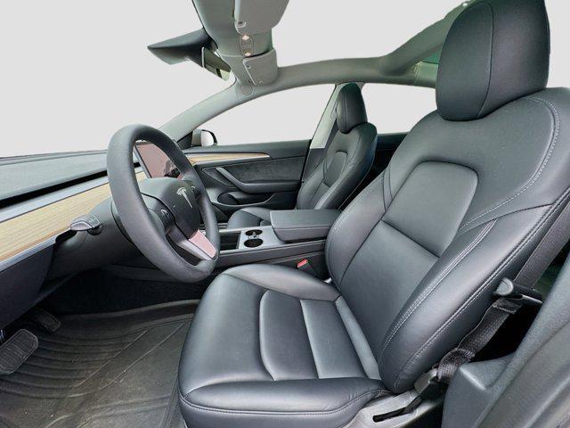 used 2023 Tesla Model 3 car, priced at $27,599