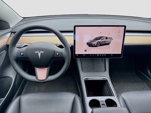 used 2023 Tesla Model 3 car, priced at $27,599