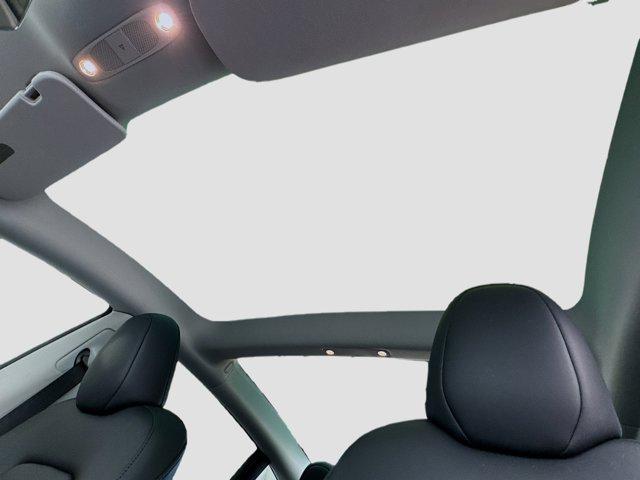 used 2023 Tesla Model 3 car, priced at $27,599