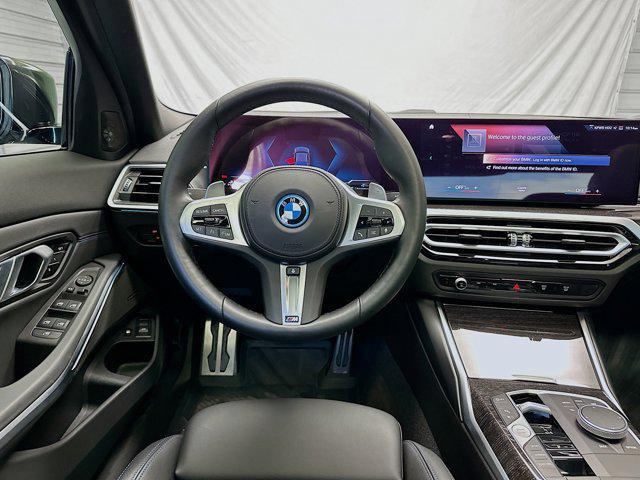 used 2023 BMW 330e car, priced at $40,520