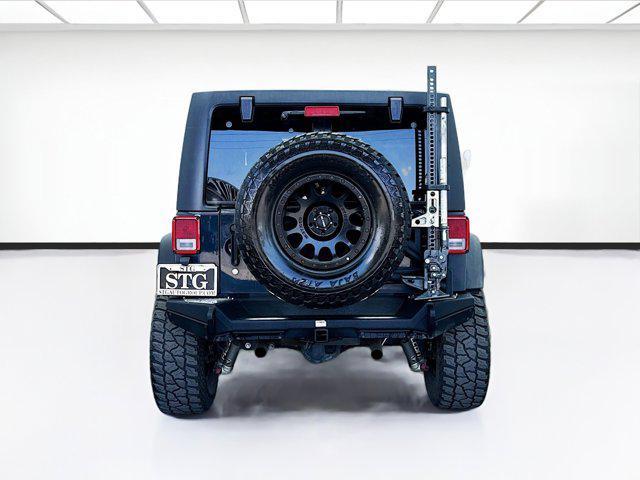 used 2016 Jeep Wrangler Unlimited car, priced at $22,479