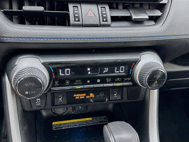 used 2021 Toyota RAV4 Hybrid car, priced at $31,199