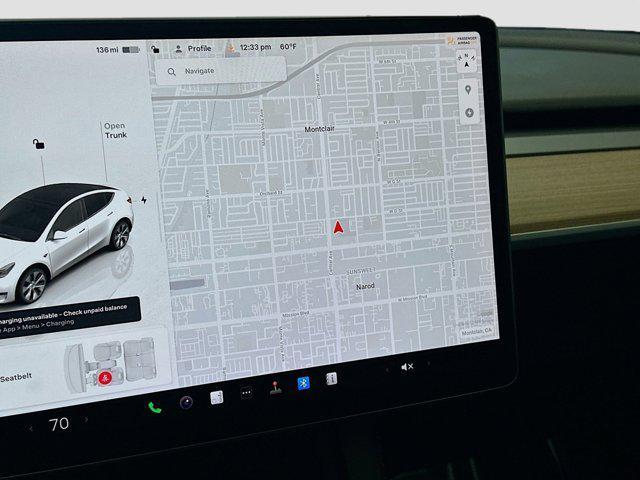 used 2023 Tesla Model Y car, priced at $30,799