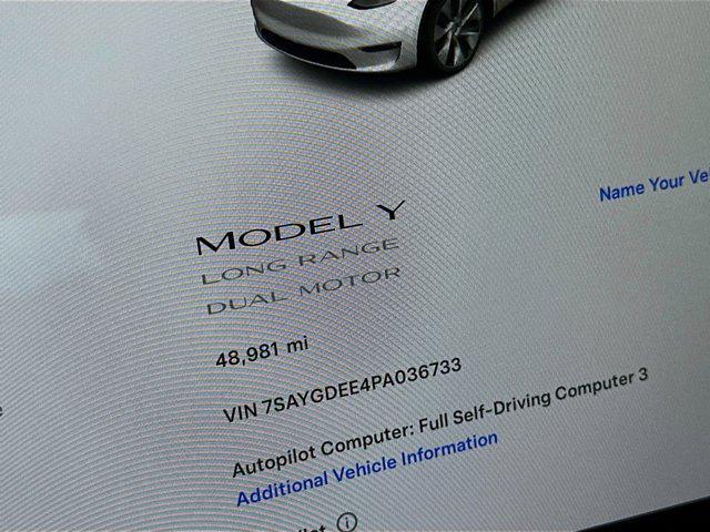 used 2023 Tesla Model Y car, priced at $30,799