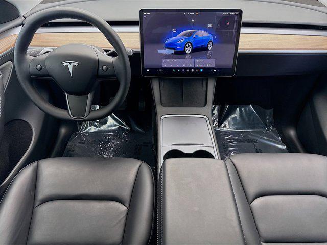 used 2024 Tesla Model Y car, priced at $34,888