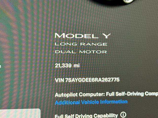 used 2024 Tesla Model Y car, priced at $33,352