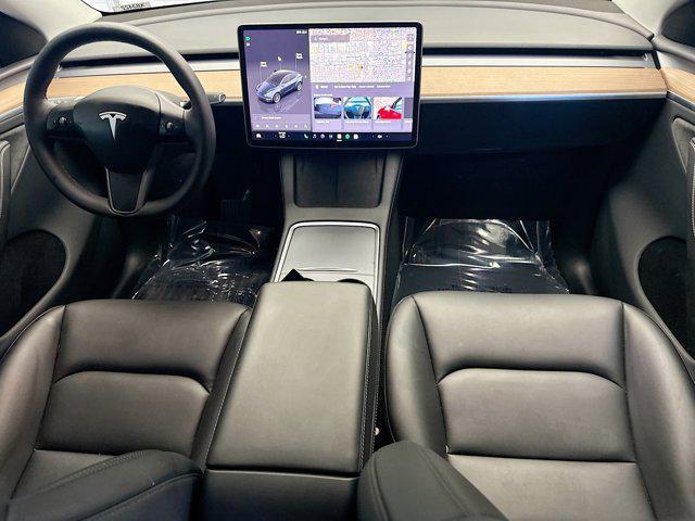 used 2024 Tesla Model Y car, priced at $33,352