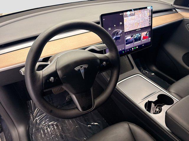used 2024 Tesla Model Y car, priced at $33,352