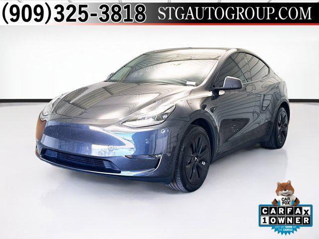 used 2024 Tesla Model Y car, priced at $33,352