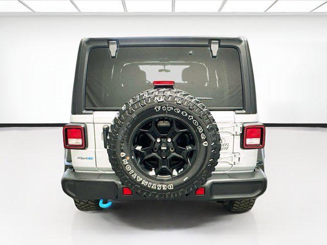used 2023 Jeep Wrangler 4xe car, priced at $28,548