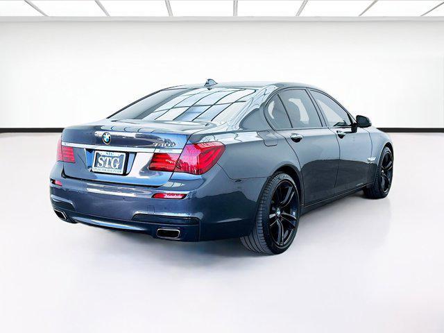 used 2013 BMW 740 car, priced at $10,888