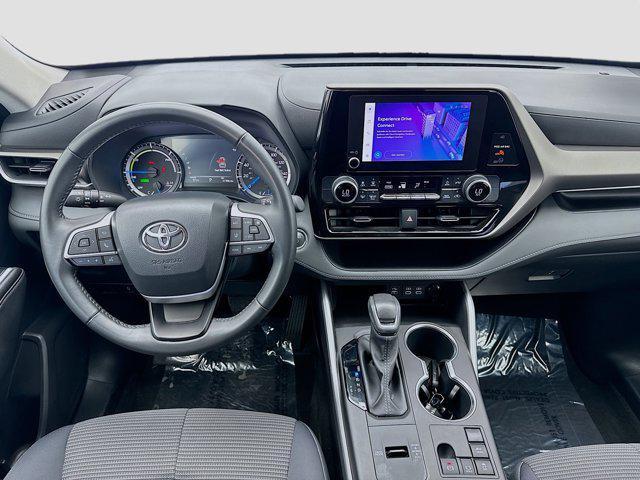 used 2023 Toyota Highlander Hybrid car, priced at $33,395