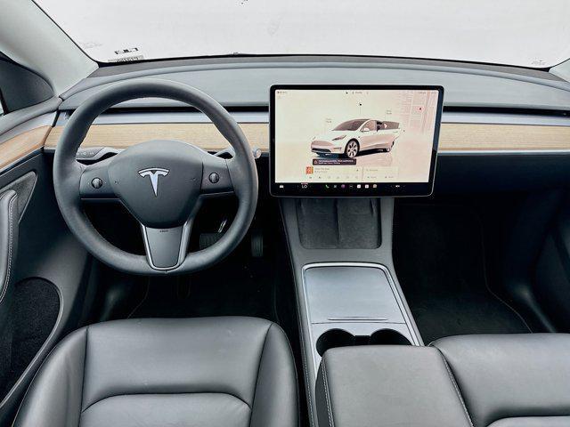 used 2023 Tesla Model Y car, priced at $34,180