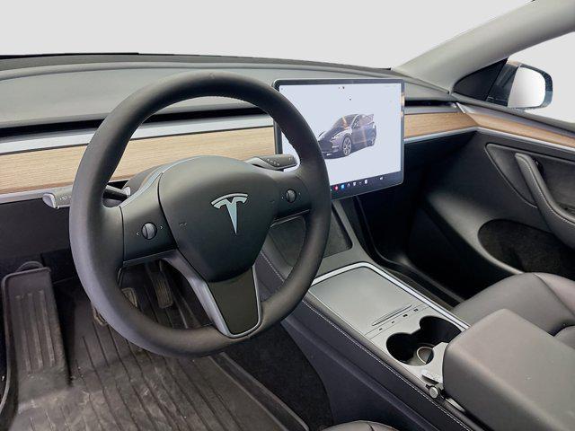 used 2024 Tesla Model Y car, priced at $33,417