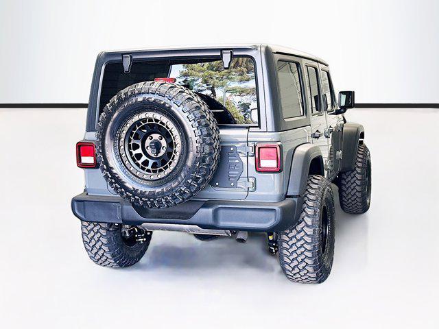 used 2021 Jeep Wrangler Unlimited car, priced at $27,983