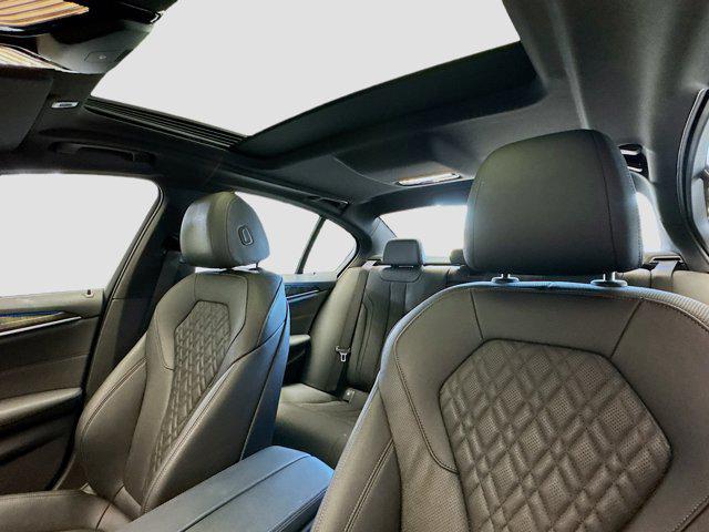 used 2023 BMW 530e car, priced at $37,488