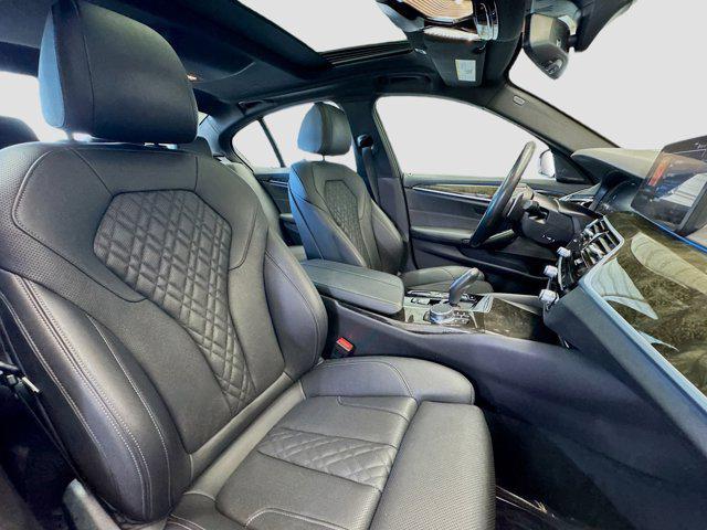 used 2023 BMW 530e car, priced at $37,488