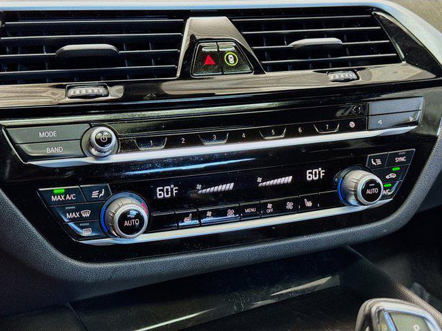 used 2023 BMW 530e car, priced at $37,488