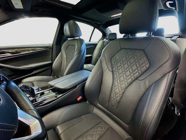 used 2023 BMW 530e car, priced at $37,488