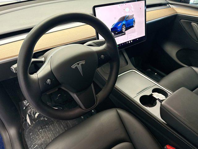 used 2023 Tesla Model Y car, priced at $29,796